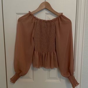 One size (S/M), peachy pink, sheer top.